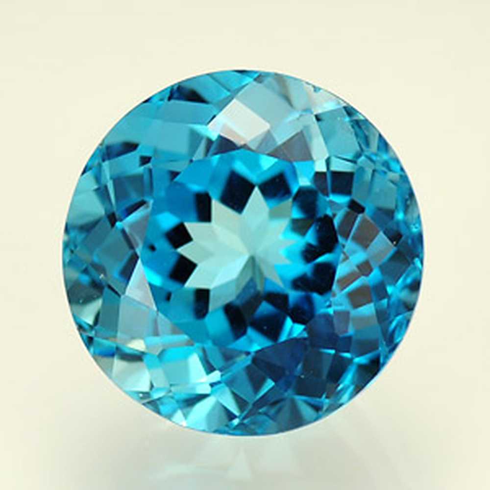 топаз камень стрелец. топаз камень стрелец. кулон с топазом в белом золоте. топаз для стрельца женщины голубой. золотое кольцо с топазом огранка триллион.